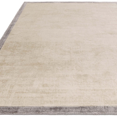 Blade Border Plain Silky Hand Woven Viscose Rug in Putty Cream with Silver Border