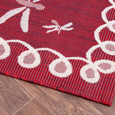 Terrace Dragonfly Outdoor Bordered Rug in Bordeaux
