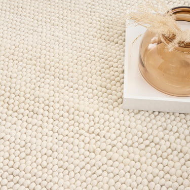 DKNY Pure Knots DKP01 Hand Made Plush Chunky Loop Texture Ivory Rug
