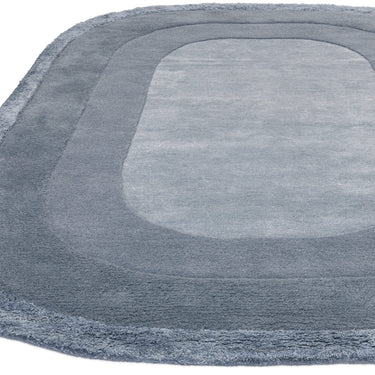Asiatic London Halo Denim Oval Tufted Ombre Blue Hand-Carved Wool Viscose Bordered Rug