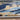 Nova NV41 Sonic Pictorial Vibrant Blue Gold Polypropylene Abstract Striped Rug