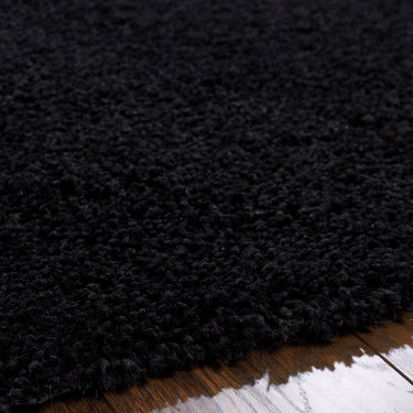 Phoenox Chicago Black Handmade Shaggy Textured Round Rug
