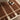 Fable Chocolate Brown Hand-Tufted Wool Checked Rug - Close Up lifestyle view