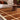 Fable Rust Hand-Tufted Wool Checked Rug - lifestyle view