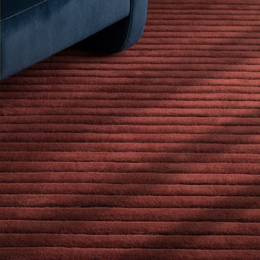 Linie Burgundy Hand-Woven Wool Ribbed Textured Rug - Close Up lifestyle view