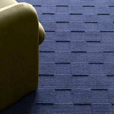 Mercer Cobalt Blue Hand-Woven Wool Checkerboard Rug - Close Up lifestyle view